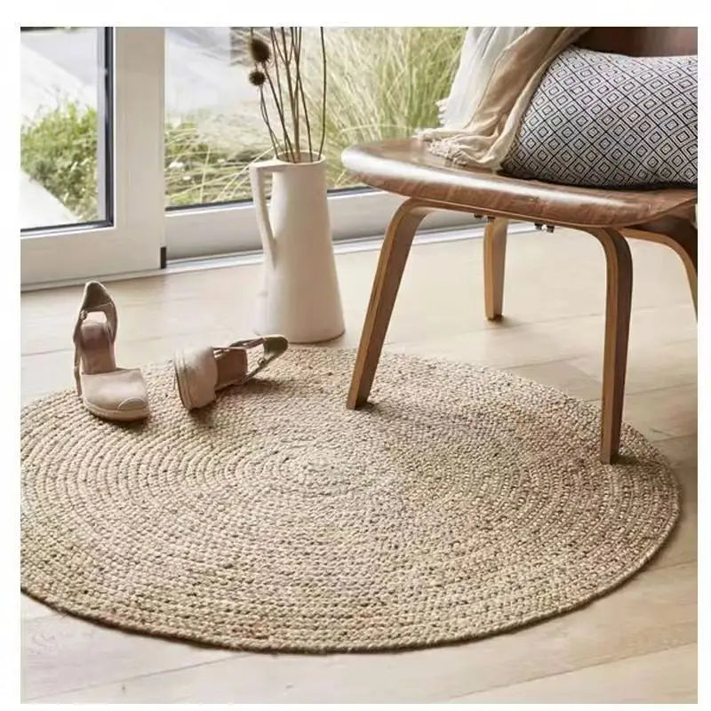 natural rug beside seating area minimal decor
