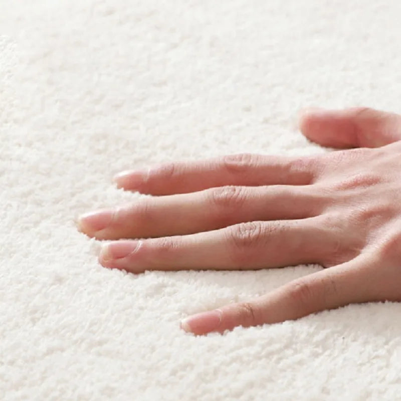 non-slip plush rug on wooden floor